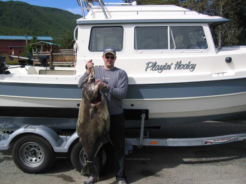 My bro and his 52\" Halibut.
