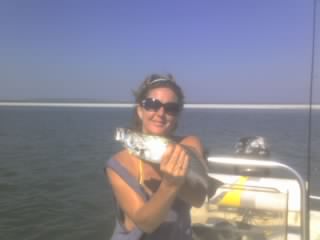 My daugher and a Trout