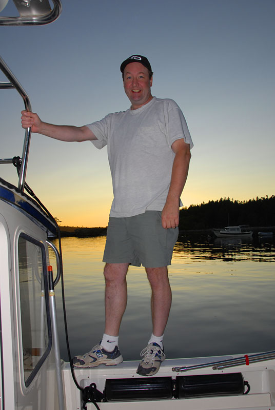 My friend Jay walking the plank at sunset