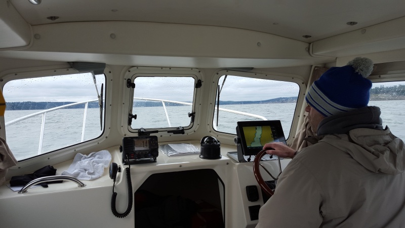 My son, Gary, helping with the first time out. It was windy and choppy except in the cove.