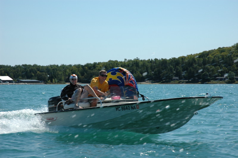 My two boys running my older son's classic 15 ft. Whaler. Boat, motor, and trailer are like new. The old 65 HP Merc. runs strong.