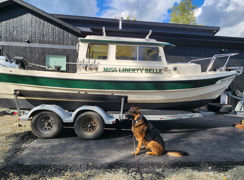 Namesake in front of boat