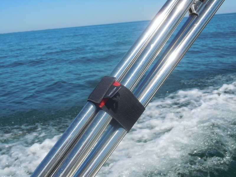 Neoprene/velcro wrap that keeps the bimini frame from rattling.