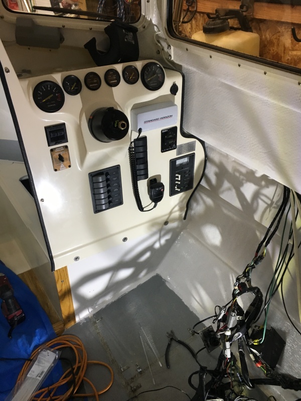 New helm pump installed. Had different bolt holes than the old one.