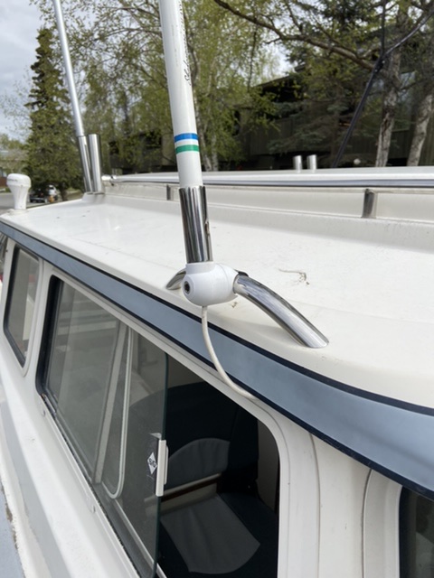 New location for antenna. Added a SS rail that mounts outside of cabin wall on overhang so there is no cabin penetration (to leak). Also allowed me to use a very low profile rail mount which I like. I could not find a roof mount small enough that it did not require me to drill holes into the cabin. Not that I don?t have some already but less is better.