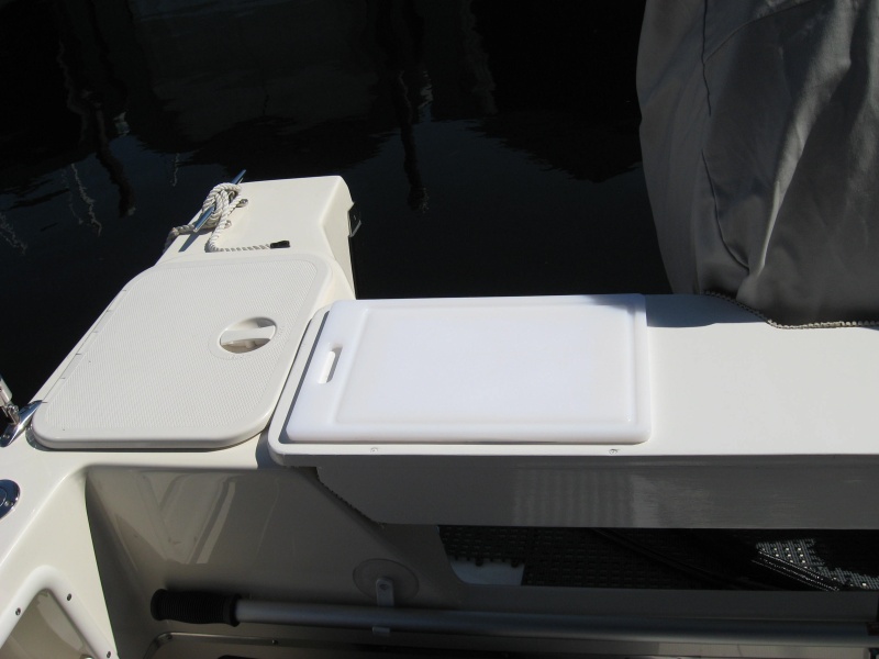 new So Pac hatches and splashwell table and cutting board   It sits on non skid pads and is held in with a bungee cord to the splashwell lip  on or off in 10 seconds very nice additional space