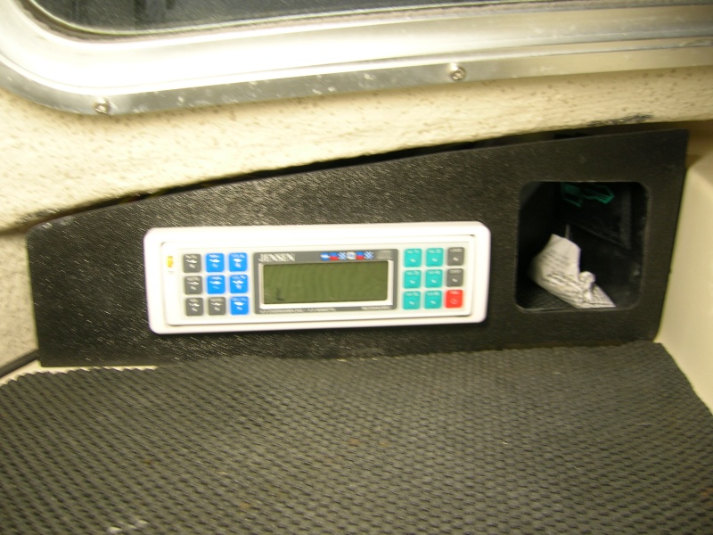 Nice Jensen marine radio/Cd player. has remote at helm for easy tuning. Also previous owner had "dash" made at Tap plastics I think. Another nice improvement.