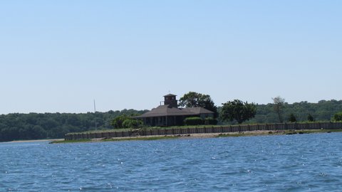 Nice place on Coecles Harbor might be able to get vehicles there using the sand spit that runs behind the house