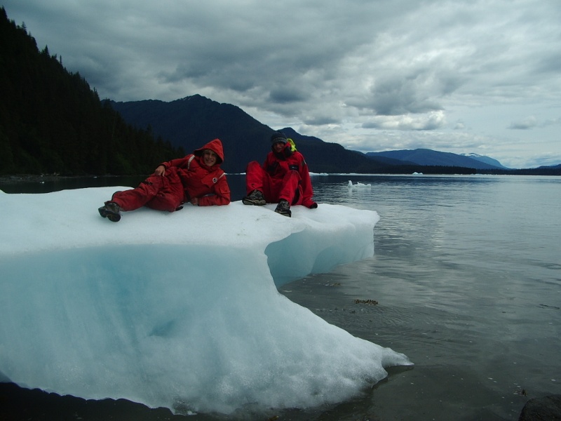 NIck and David ON some cool ice!  OK, it is not safe to be climbing around on ice bergs, they may roll.  This one is actually grounded, I am photographing from the beach!