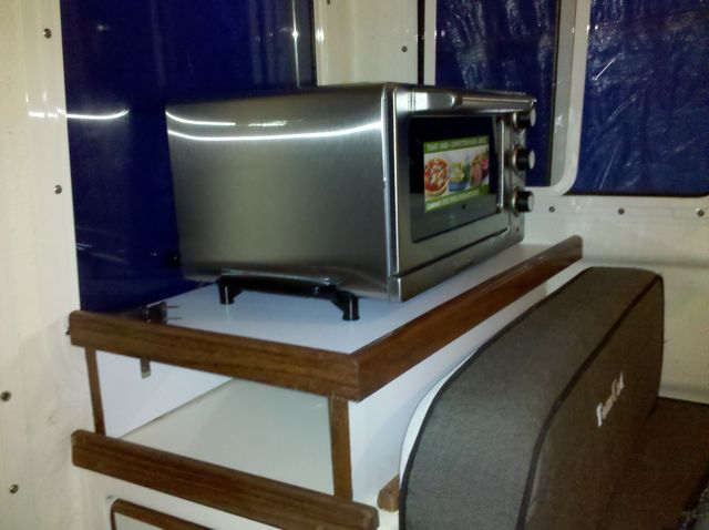 Now I need to:
1) wire in another outlet
2) buy 2 baskets to use a drawers under the shelf.