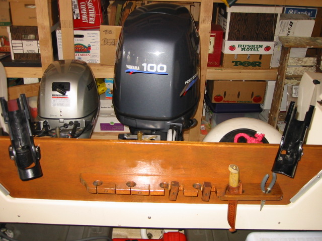 OEM pole-holder teak bracket.