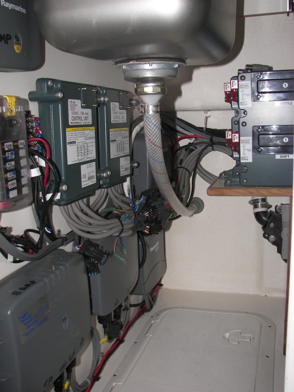 Okay, it's a "yay-boo" thing where the installer (not C-Dory) put the electronics - under the galley cabinet. Easy access, but you've got to keep large metal things out. I use vinyl tubs for food, etc. here.