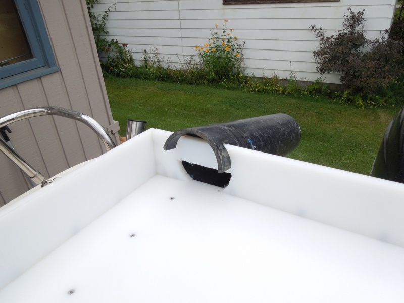 Old drain spout off old cutting board top.