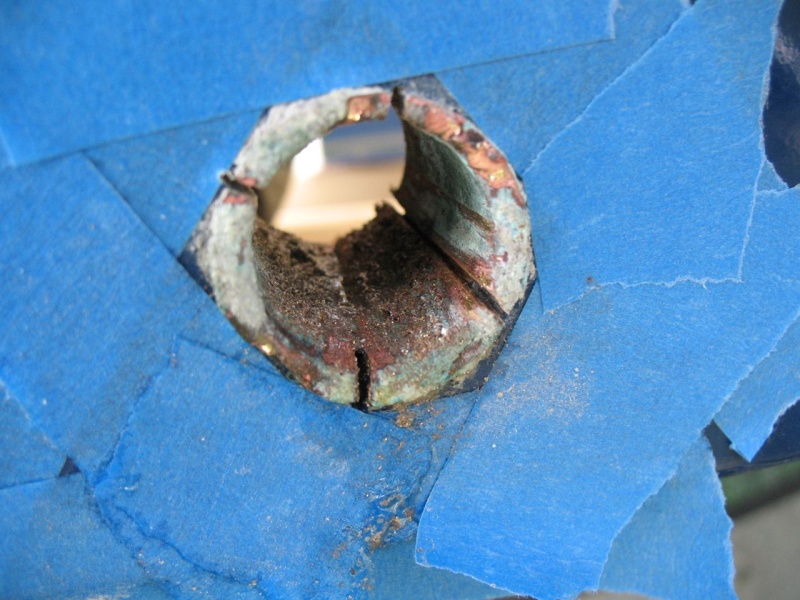 Old tube, last cuts. I got nervous at this time, because as I got close to all the way through the 6 o'clock cut, water started to lubricate the saw blade.  Uh-oh.