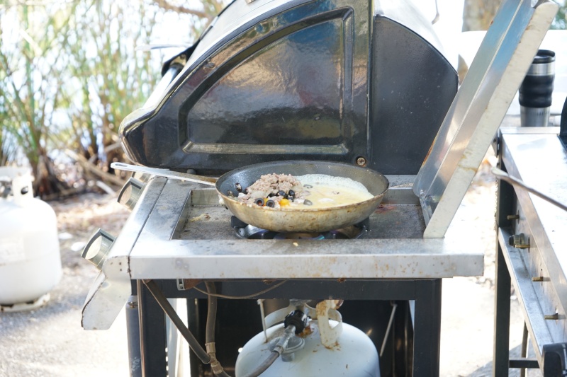 Omelette cooking: good wild bore sausage, Olives cheese etc (oysters do well here also)