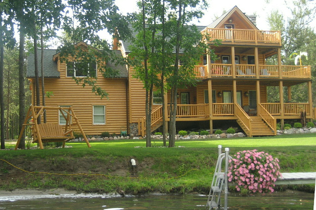 One of many beautiful homes along the waterway, this one on Crooked River.
