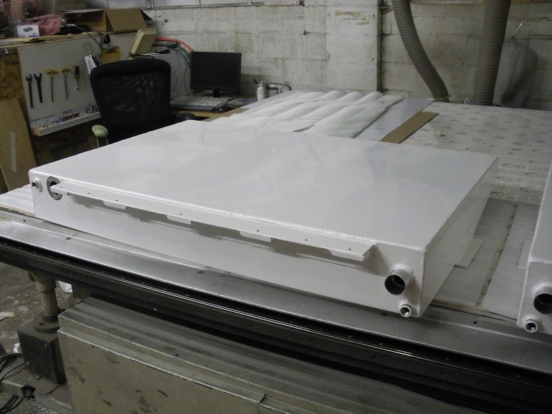 One of the two new fuel tanks, 1/8" aluminum powder coated white, 22 gallons, to be mounted one on each side of the boat