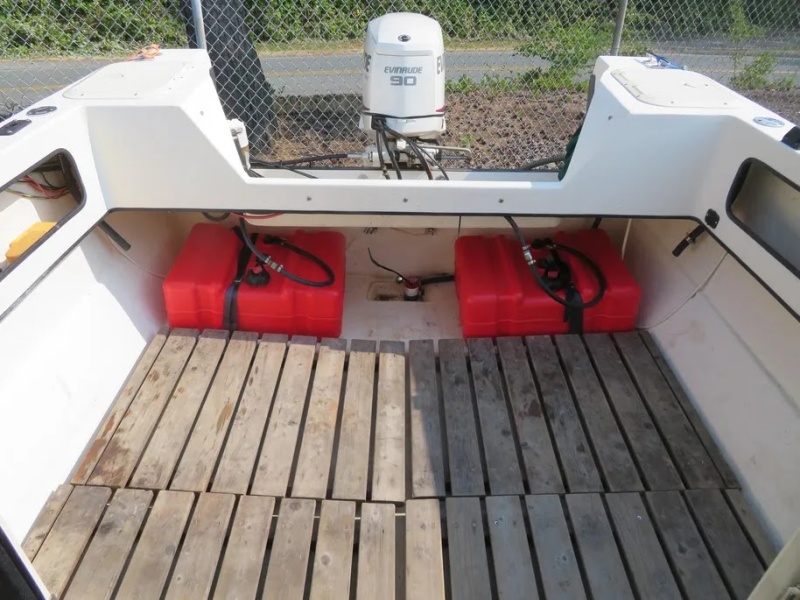 Original fuel tanks had been removed but were included with the boat. Rustic pallet floor.