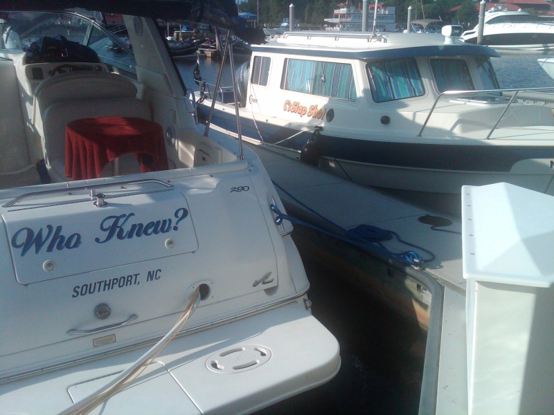 Our first overnight.  Barefoot Landing SC.  Next to our friends in "Who Knew".  Window shades are up - Sunbrella stripe.
