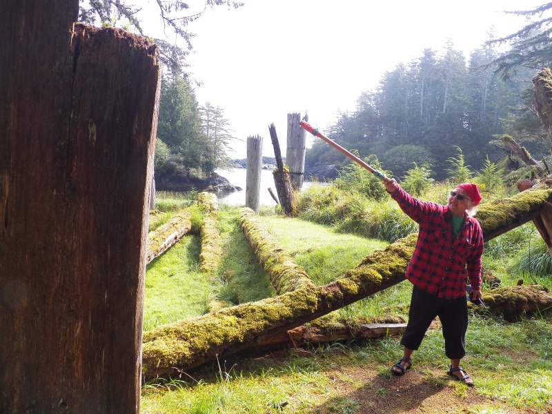 Our Watchman (guide) explains Haida architecture and that each house had a sunken floor as shown to the left.