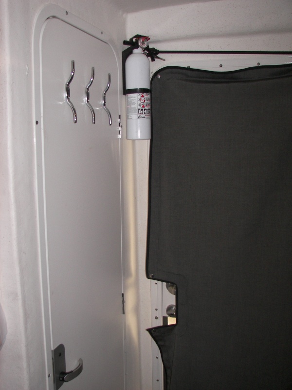 Outside view of hooks.  I am putting a couple more on the door jamb forward of these.