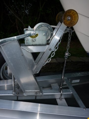 P1000486 Some scrap 3 x 4" aluminum angle 1/2" stainless u-bolt 35 dollar stainless turnbuckle, short piece of chain, and a shackle.