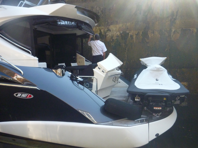 P1020392 The captain was delivering this new boat. I guess he will ride the jet ski home. Not my style but it was a beautiful boat