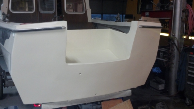 Painted Transom Ready for the new outboard on Tuesday.