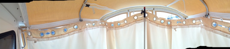 Panoramic of our new arrangement.  We use clips to attach the rope to the hand rails, and a boat hook as a center pole.  This makes deployment rapid.