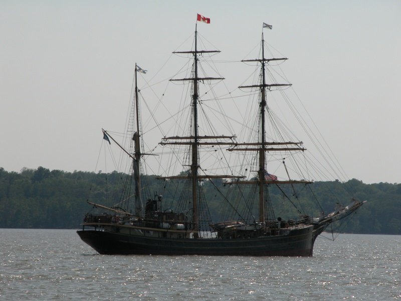 Passing astern, while on board the ferry, the tall ship, PICTON CASTLE, from Canada anchorded on the James River.