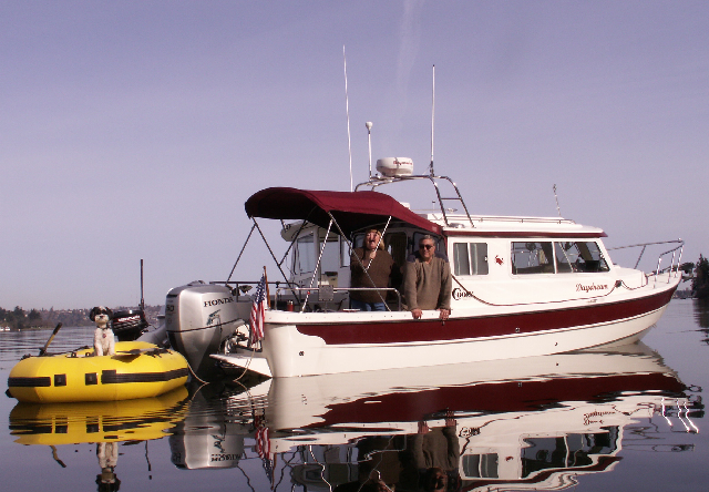 Pat and Patty on Daydream - Baxter in Dinghy
