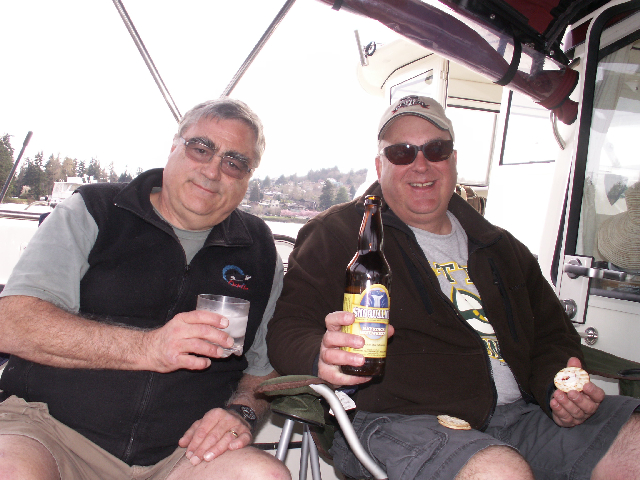 Pat Anderson and Garry Anderson - Sundowners on Cockpit of Daydream 4-4-09