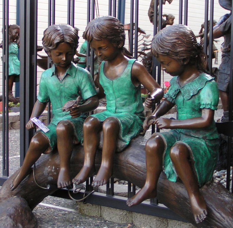 (Pat Anderson) Statues in a Courtyard on First Street
