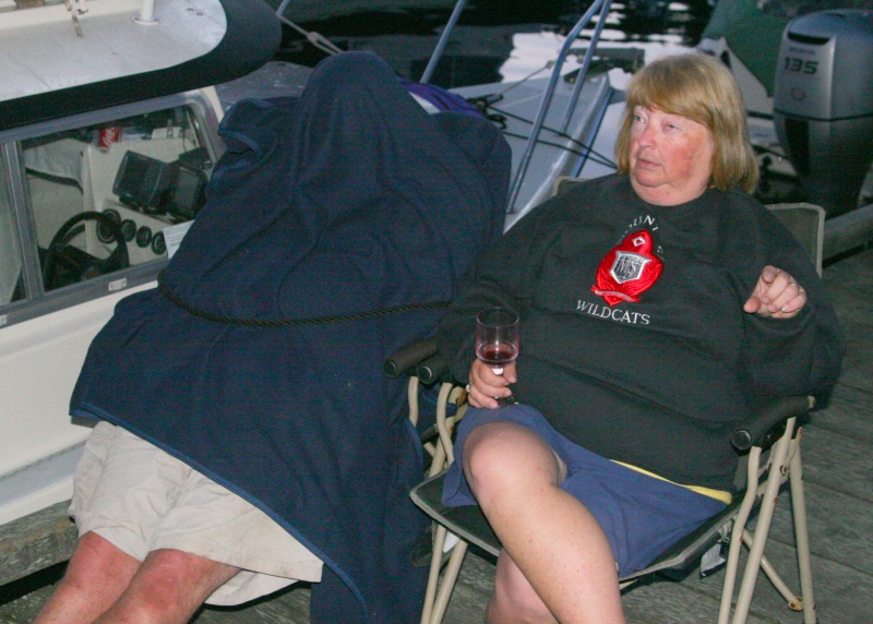 Pat catches some Z's while the group chats. Note that someone -- believed to be a relative -- has tied him to his chair.