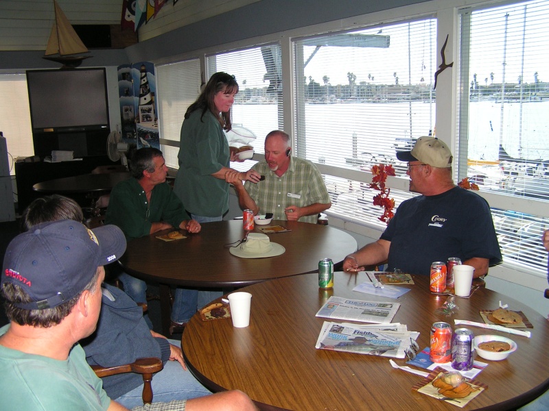 Pat feeding Roger dessert.
