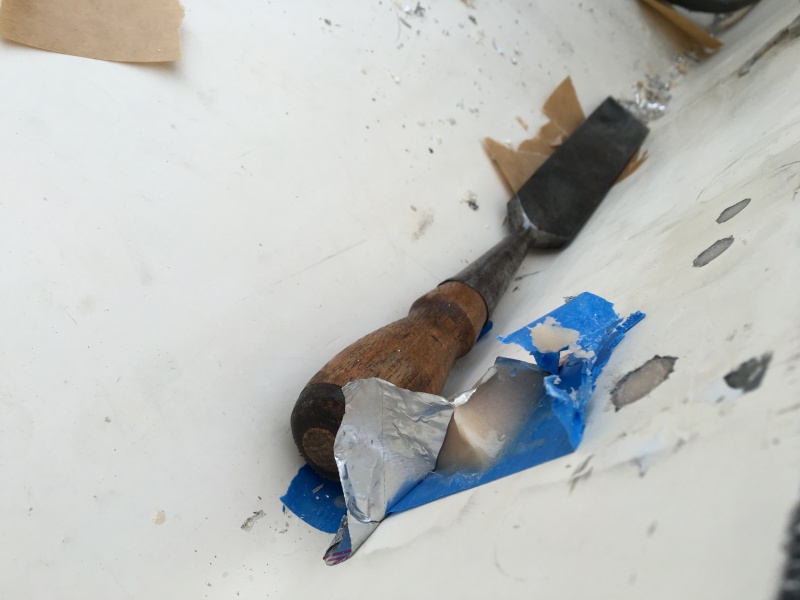 Peeled off the tape on the reservoir, chiseled it flat (I\'m a good chisel guy.  If you aren\'t a good chisel guy maybe use a sanding block)