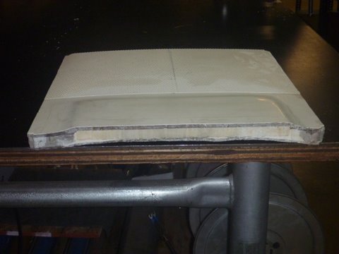 Pictured is a section of our roof cut for the air conditioner installation