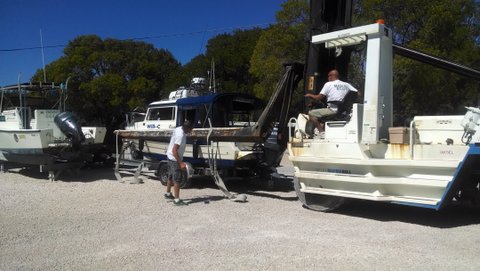 Pilot House Marina lifting Will-C off the trailer in Key Largo