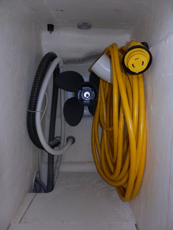 Pipe elbow for cord hanger