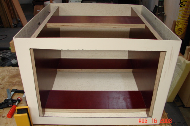 Plywood frame in position in seat base