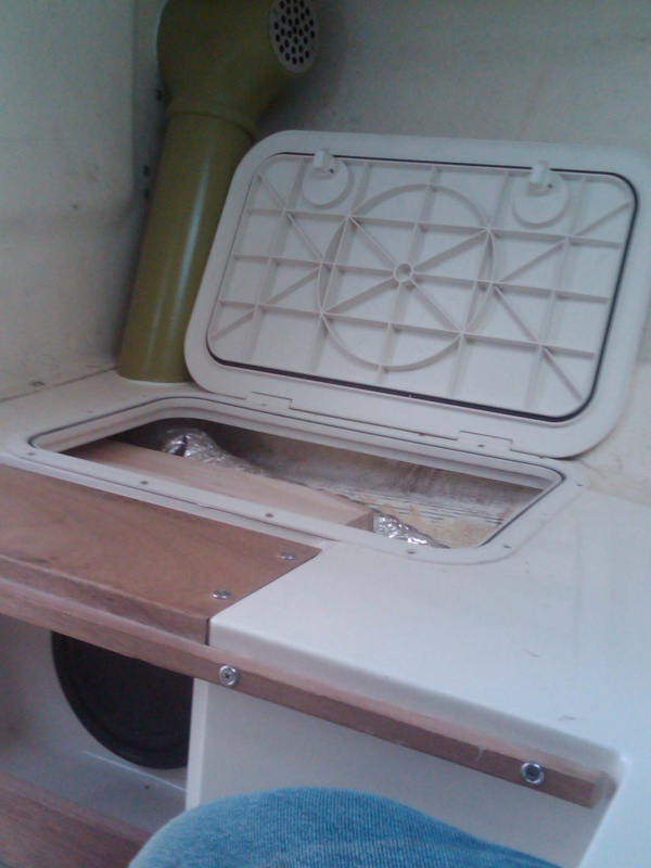 port access hatch w.sub woofer cabinet and air conditioning duct