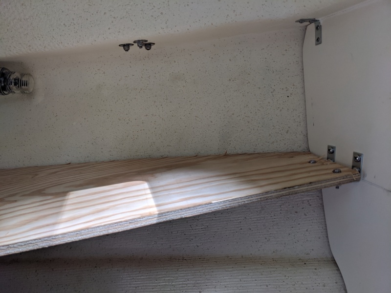 Port-side cuddy shelf. Attached to front (flotation) bulkhead, and cabin bulkhead