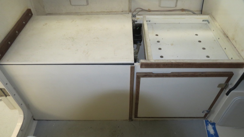 port side of cabin, livewell and seat.  Cushions are included