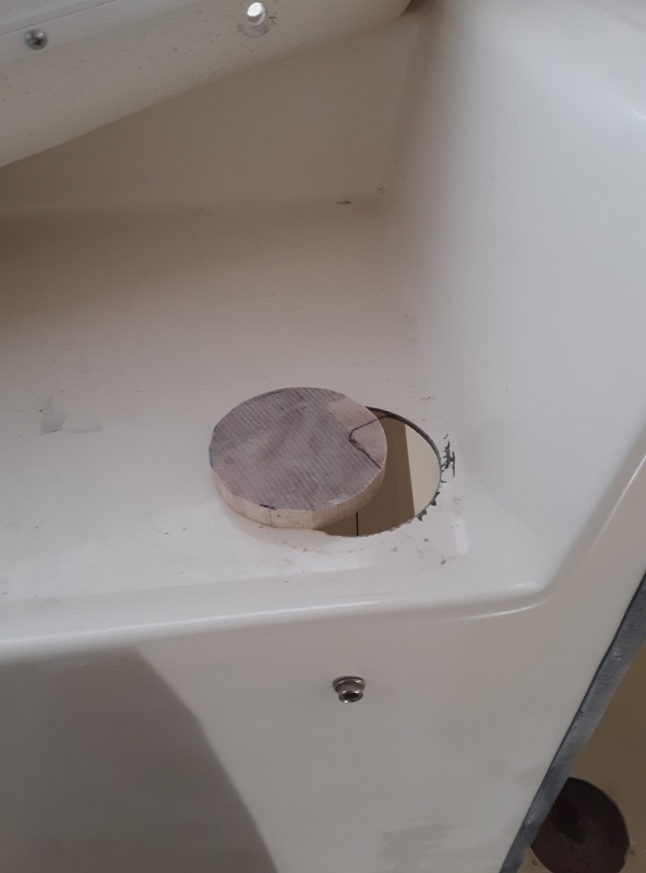 port side, there was some crappy cup holder thing here