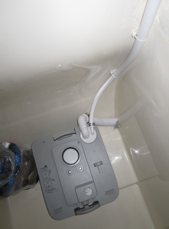 potti with top tank removed to show plumbing connections to MSD fitting suppied with marine kit including hold-down brackets