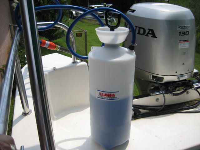 pressure container to flush motor with concentrated \"Salt away\"