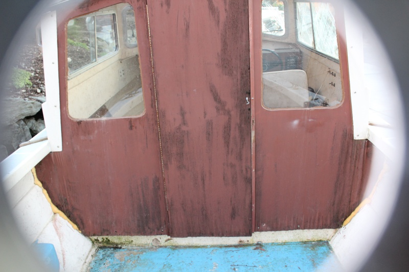 pretty rough plywood bulkhead, gone now, will be canvas