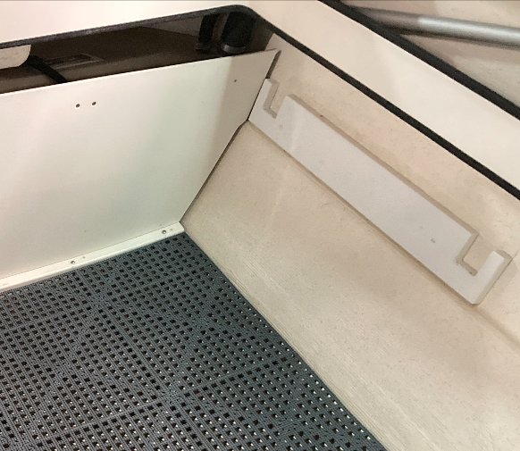 primed and painted - only used boatlife life-calk because the brackets rest on the chamfer and I don't consider this to be a permanent boat fixture (hence the free wood, dumpster brackets, and repurposed IKEA cushions.