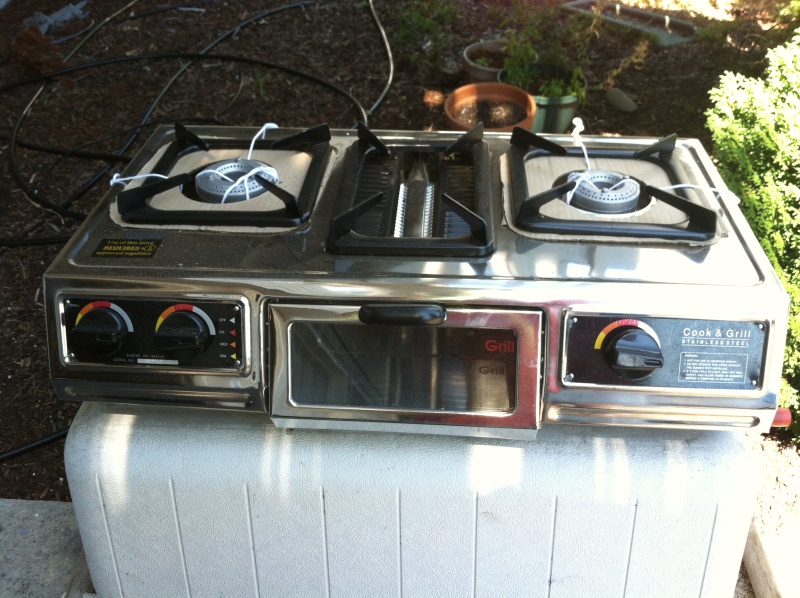 Prior to deciding to sell our C-Dory, we had considered re-building the cabinets and installing this propane stove. It will go with the boat at the buyer's discretion.