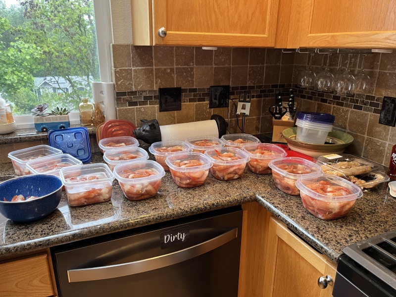 Processing for freezing.  25 shrimp per container.